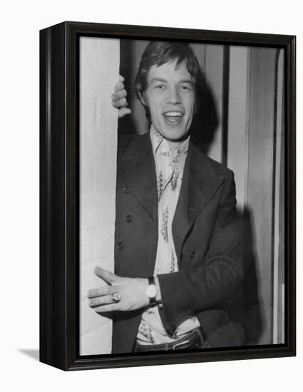 Mick Jagger in a Door-Associated Newspapers-Framed Stretched Canvas