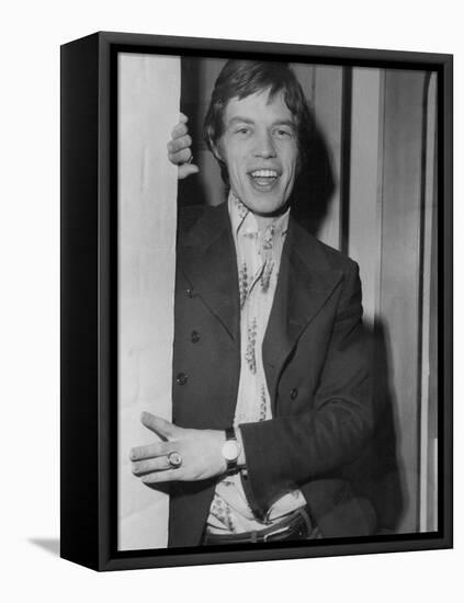 Mick Jagger in a Door-Associated Newspapers-Framed Stretched Canvas