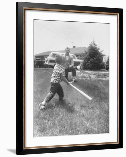 Mickey Mantle's Son Batting at Ball Pitched by Him-Ralph Morse-Framed Premium Photographic Print