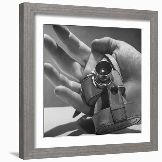 Micro Camera Resting in Palm of Hand-Andreas Feininger-Framed Photographic Print