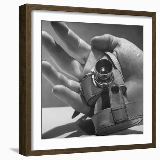 Micro Camera Resting in Palm of Hand-Andreas Feininger-Framed Photographic Print