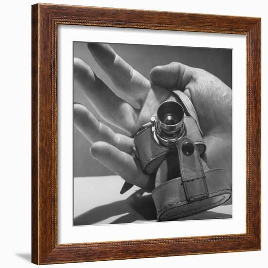 Micro Camera Resting in Palm of Hand-Andreas Feininger-Framed Photographic Print