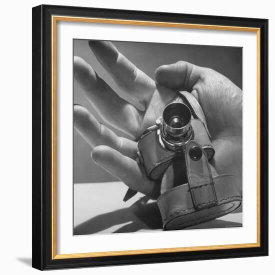 Micro Camera Resting in Palm of Hand-Andreas Feininger-Framed Photographic Print