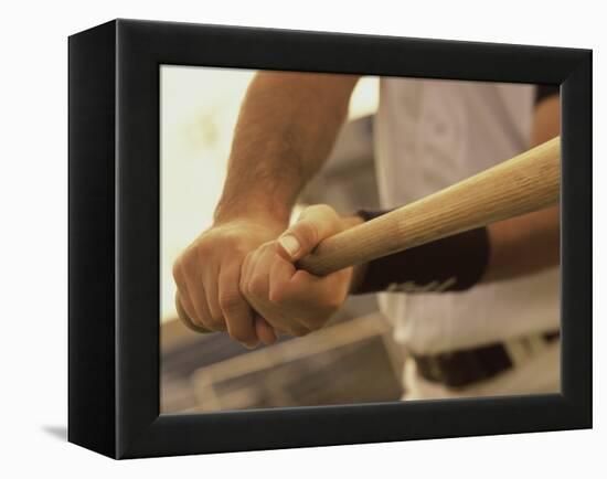 Mid Section View of a Baseball Player Swinging a Baseball Bat-null-Framed Premier Image Canvas