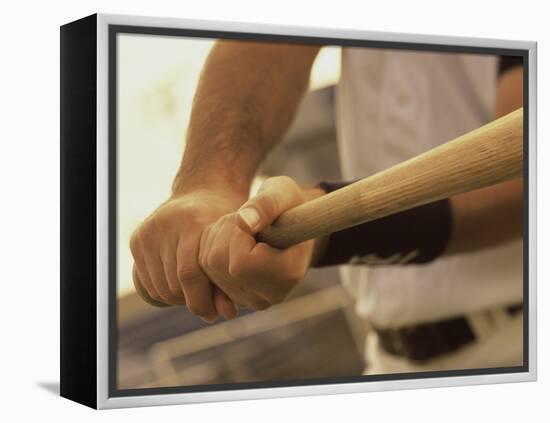 Mid Section View of a Baseball Player Swinging a Baseball Bat-null-Framed Premier Image Canvas