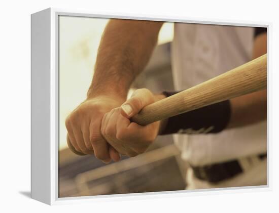 Mid Section View of a Baseball Player Swinging a Baseball Bat-null-Framed Premier Image Canvas