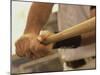 Mid Section View of a Baseball Player Swinging a Baseball Bat-null-Mounted Photographic Print
