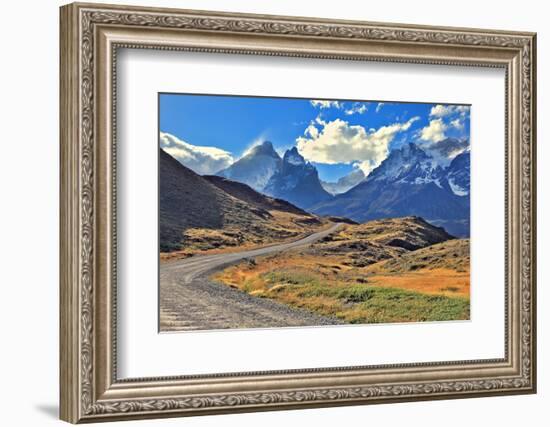 Midday Landscape in the National Park Torres Del Paine; Chile. the Gravel Road is Bent between Yell-kavram-Framed Photographic Print