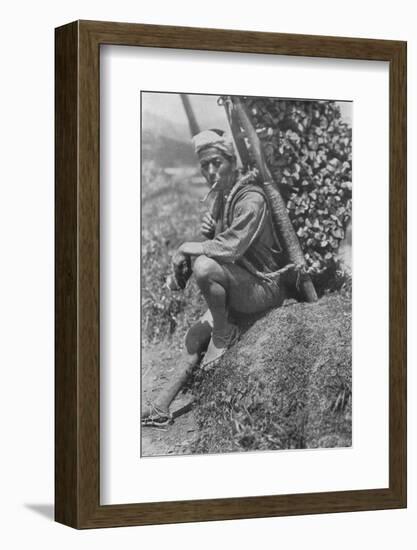 'Middle-aged coolie hurriedly seated himself on the bank to pass us in review', c1900, (1921)-Julian Leonard Street-Framed Photographic Print