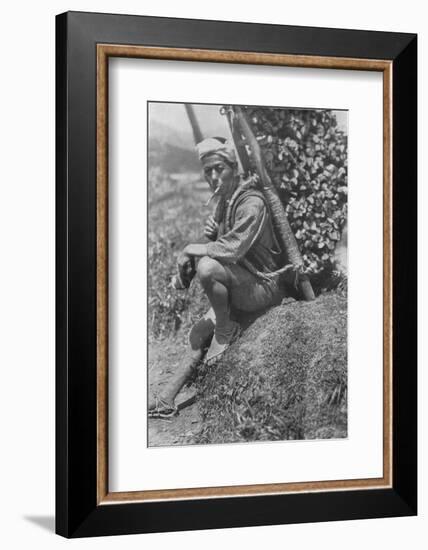 'Middle-aged coolie hurriedly seated himself on the bank to pass us in review', c1900, (1921)-Julian Leonard Street-Framed Photographic Print