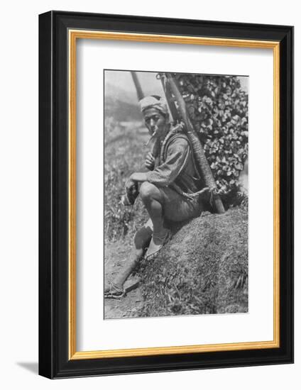 'Middle-aged coolie hurriedly seated himself on the bank to pass us in review', c1900, (1921)-Julian Leonard Street-Framed Photographic Print