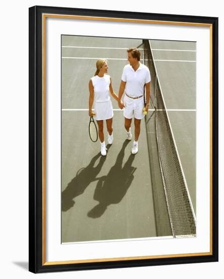 Middle-Aged Couple Relaxing after Tennis Match-Bill Bachmann-Framed Photographic Print