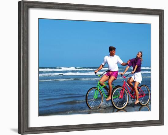 Middle-aged Couple Riding Bikes on the Beach-Bill Bachmann-Framed Photographic Print