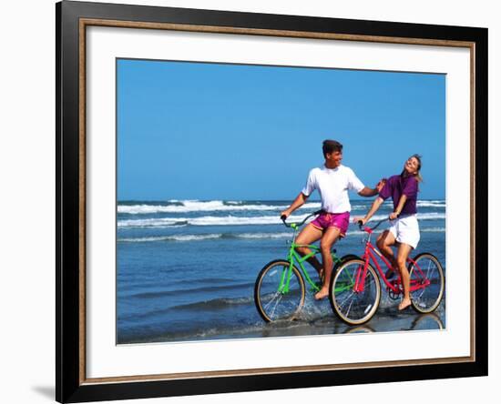 Middle-aged Couple Riding Bikes on the Beach-Bill Bachmann-Framed Photographic Print