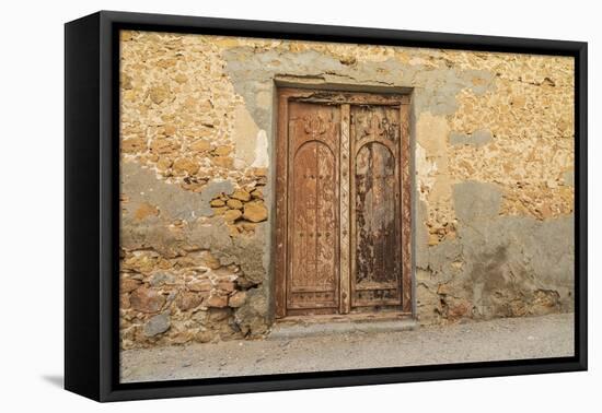 Middle East, Arabian Peninsula, Al Batinah South. Old wooden door on a building in Oman.-Emily Wilson-Framed Premier Image Canvas