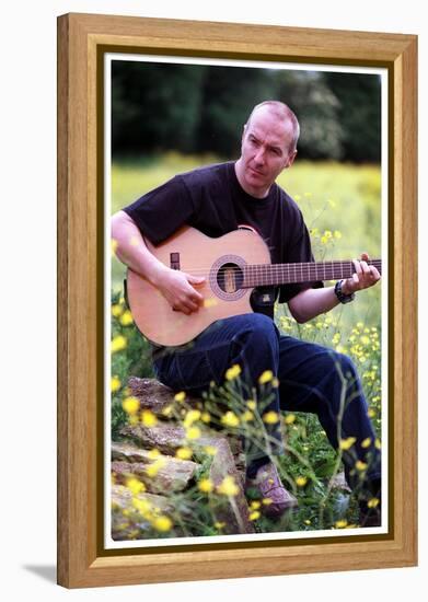 Midge Ure Playing Guitar June 2001-null-Framed Premier Image Canvas