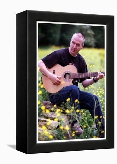 Midge Ure Playing Guitar June 2001-null-Framed Premier Image Canvas