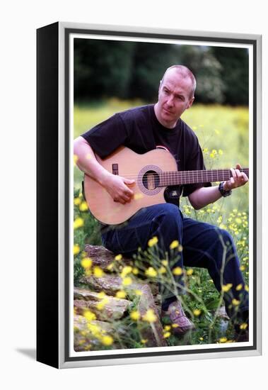 Midge Ure Playing Guitar June 2001-null-Framed Premier Image Canvas