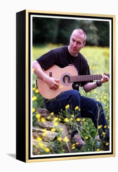 Midge Ure Playing Guitar June 2001-null-Framed Premier Image Canvas