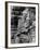 Midwestern Architect Frank Lloyd Wright sits against stone wall-Eliot Elisofon-Framed Premium Photographic Print