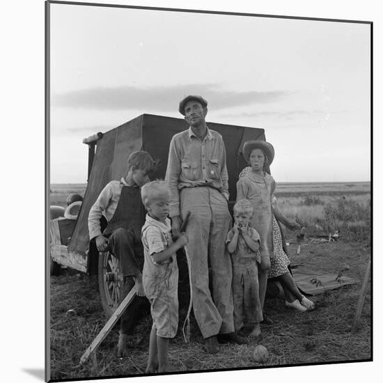 Migrant farm labourer with his children on the road in Texas, 1938-Dorothea Lange-Mounted Photographic Print