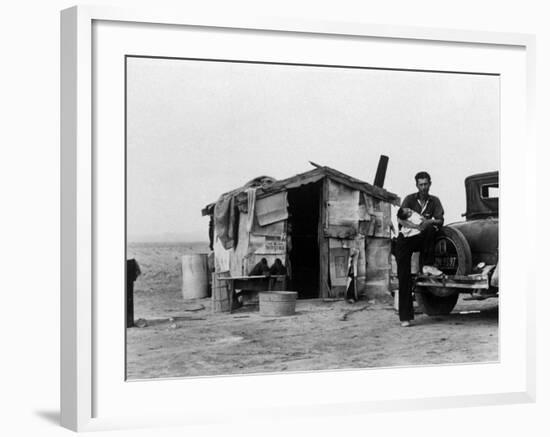 Migrant Father Cradling His Baby Outside Shanty-Dorothea Lange-Framed Photographic Print