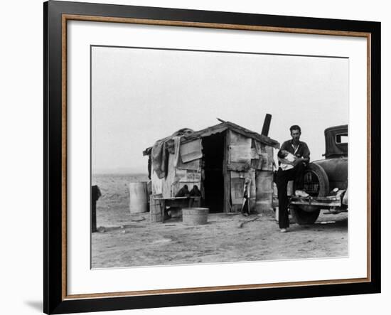 Migrant Father Cradling His Baby Outside Shanty-Dorothea Lange-Framed Photographic Print