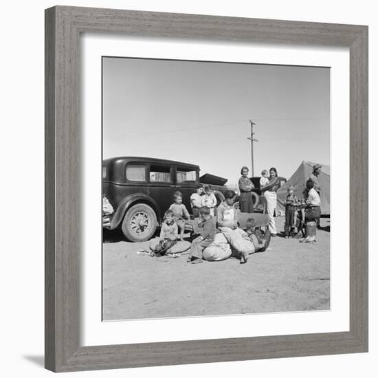 Migrating families camp by the road on their way to California, 1937-Dorothea Lange-Framed Photographic Print