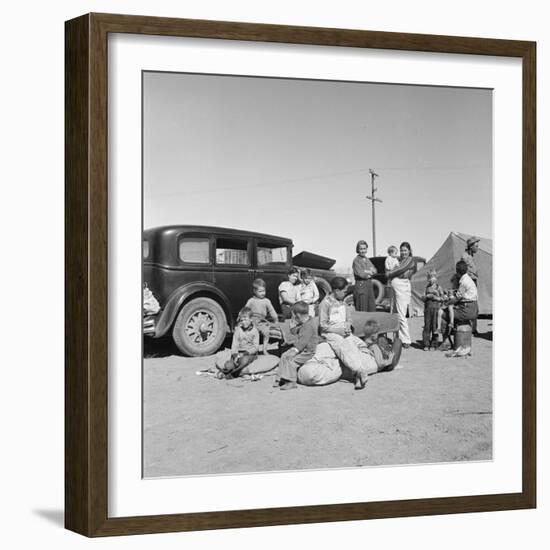 Migrating families camp by the road on their way to California, 1937-Dorothea Lange-Framed Photographic Print