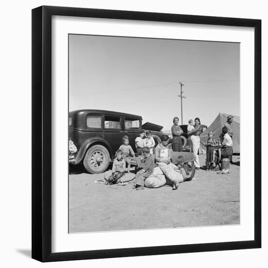 Migrating families camp by the road on their way to California, 1937-Dorothea Lange-Framed Photographic Print