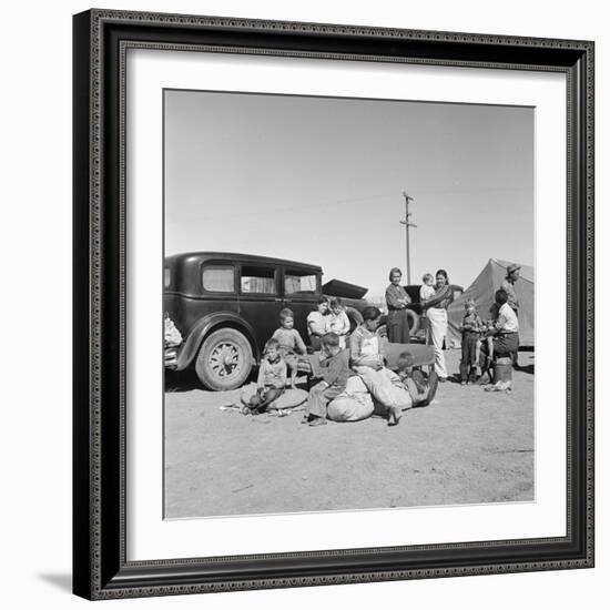 Migrating families camp by the road on their way to California, 1937-Dorothea Lange-Framed Photographic Print