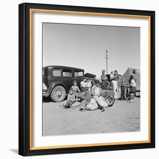 Migrating families camp by the road on their way to California, 1937-Dorothea Lange-Framed Photographic Print