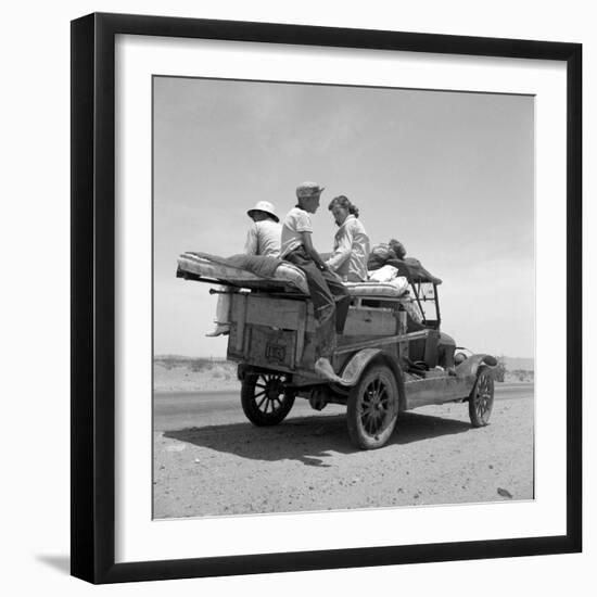 Migratory family traveling in search of work to New Mexico along U.S. Route 70, Arizona, 1937-Dorothea Lange-Framed Photographic Print