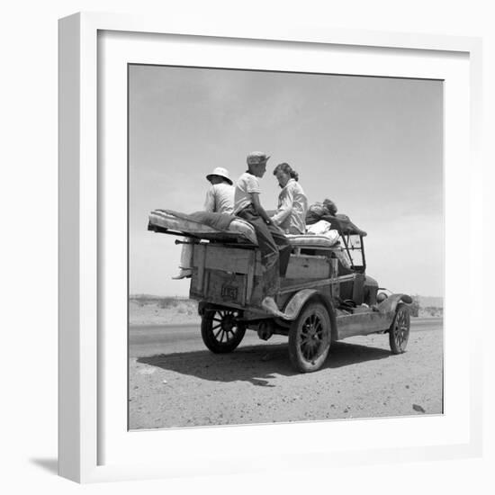 Migratory family traveling in search of work to New Mexico along U.S. Route 70, Arizona, 1937-Dorothea Lange-Framed Photographic Print
