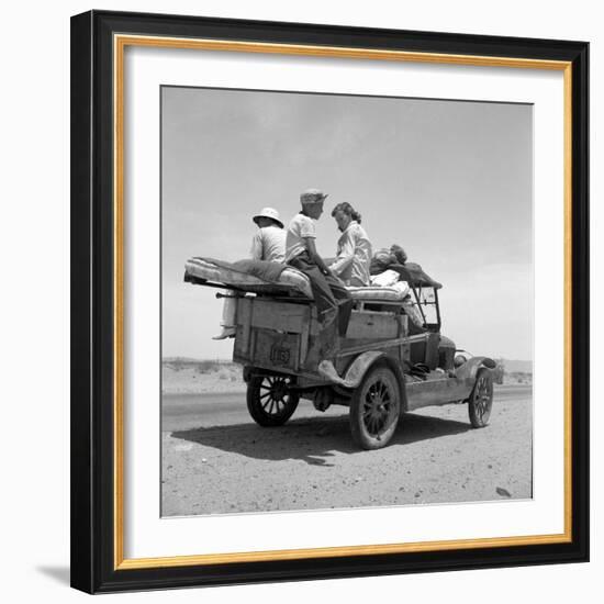 Migratory family traveling in search of work to New Mexico along U.S. Route 70, Arizona, 1937-Dorothea Lange-Framed Photographic Print