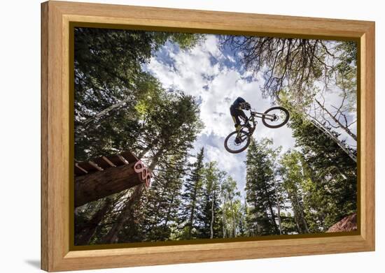 Mike Montgomery Jumping His Downhill Mountain Bike At Canyons Resort-Louis Arevalo-Framed Premier Image Canvas