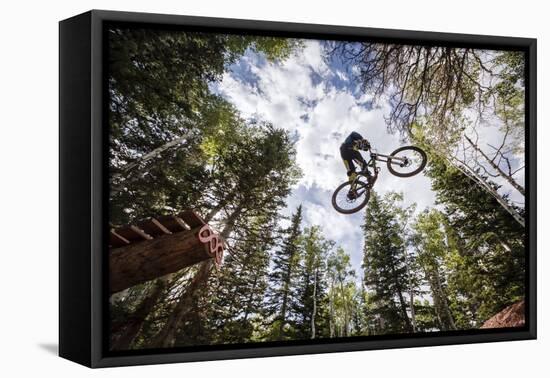 Mike Montgomery Jumping His Downhill Mountain Bike At Canyons Resort-Louis Arevalo-Framed Premier Image Canvas