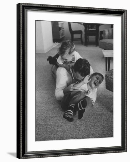 Mike Sibole, Four-Year-Old Recently Blinded to Save His Life, Playing with Father and Brother-Stan Wayman-Framed Photographic Print