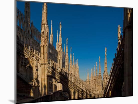 Milan, Milan Province, Lombardy, Italy. Spires on the roof of the Duomo, or cathedral.-null-Mounted Photographic Print