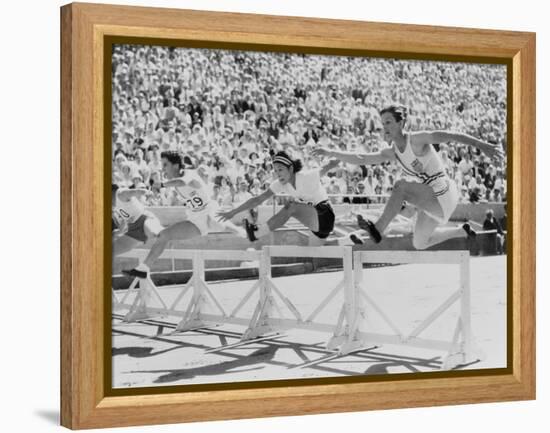 Mildred 'Babe' Didrikson, Running the 80-Meter Hurdles, at the 1932 Olympics-null-Framed Stretched Canvas