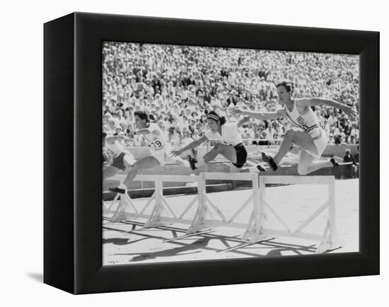 Mildred 'Babe' Didrikson, Running the 80-Meter Hurdles, at the 1932 Olympics-null-Framed Stretched Canvas