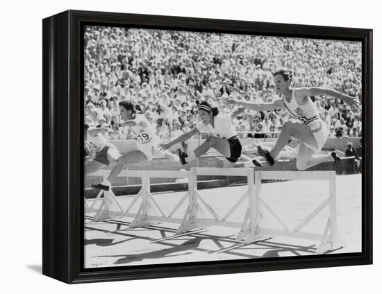 Mildred 'Babe' Didrikson, Running the 80-Meter Hurdles, at the 1932 Olympics-null-Framed Stretched Canvas