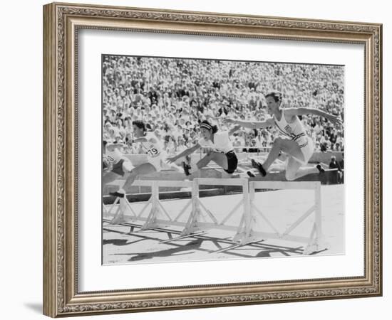 Mildred 'Babe' Didrikson, Running the 80-Meter Hurdles, at the 1932 Olympics-null-Framed Photo