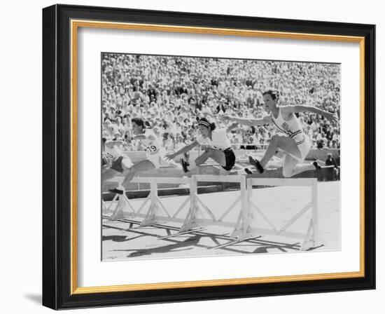 Mildred 'Babe' Didrikson, Running the 80-Meter Hurdles, at the 1932 Olympics-null-Framed Photo