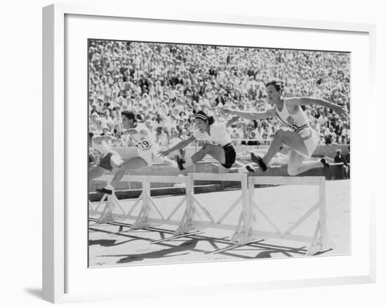 Mildred 'Babe' Didrikson, Running the 80-Meter Hurdles, at the 1932 Olympics-null-Framed Photo