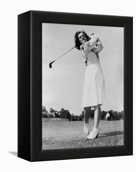 Mildred 'Babe' Didrikson Zaharias Swinging Golf Club in 1947-null-Framed Stretched Canvas