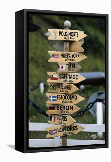 Mileage Sign Pointing Directions in Puerto Williams-Paul Souders-Framed Premier Image Canvas