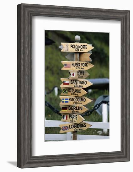 Mileage Sign Pointing Directions in Puerto Williams-Paul Souders-Framed Photographic Print