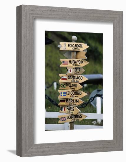 Mileage Sign Pointing Directions in Puerto Williams-Paul Souders-Framed Photographic Print