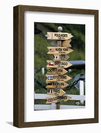 Mileage Sign Pointing Directions in Puerto Williams-Paul Souders-Framed Photographic Print